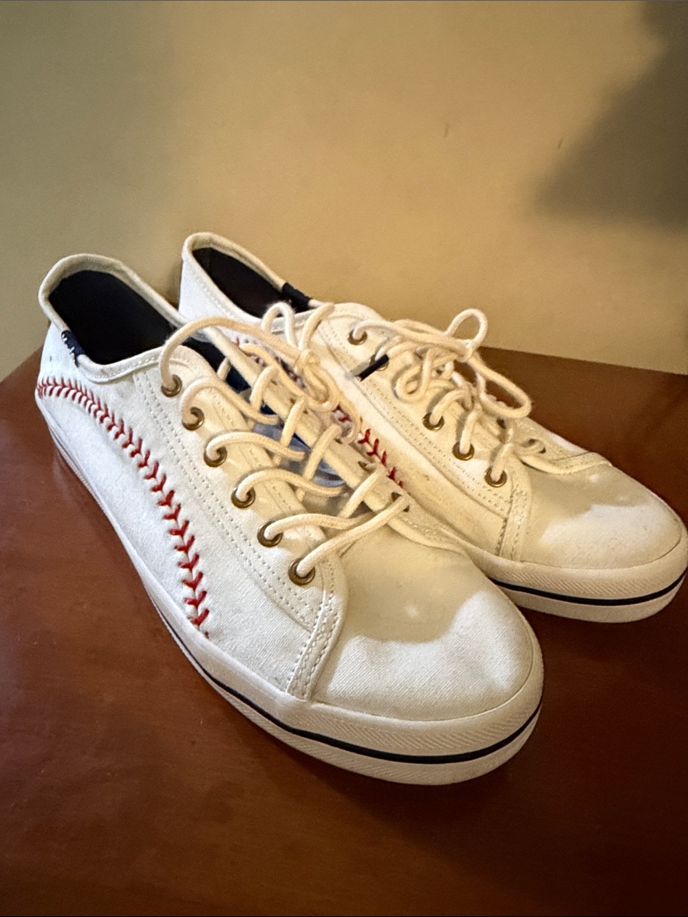 Keds White Canvas Sneakers with Red Stitch Detail
